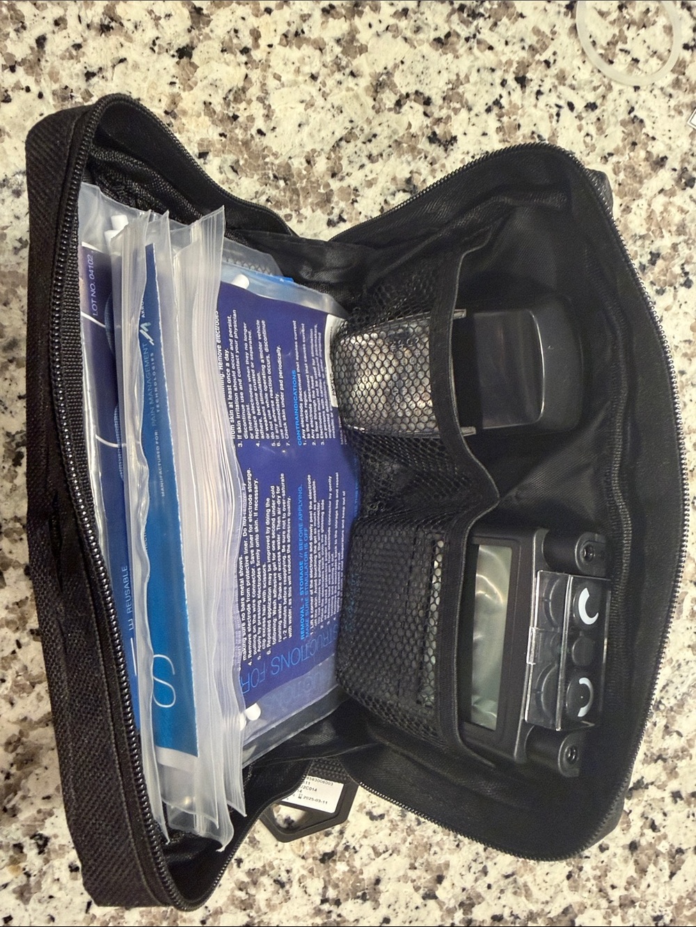 tens unit in Black Travel Pouch